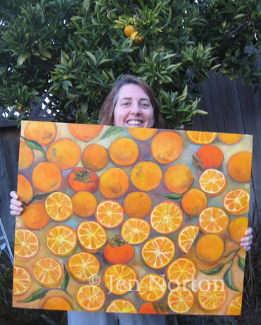 Jen Norton with her painting of oranges and persimmons